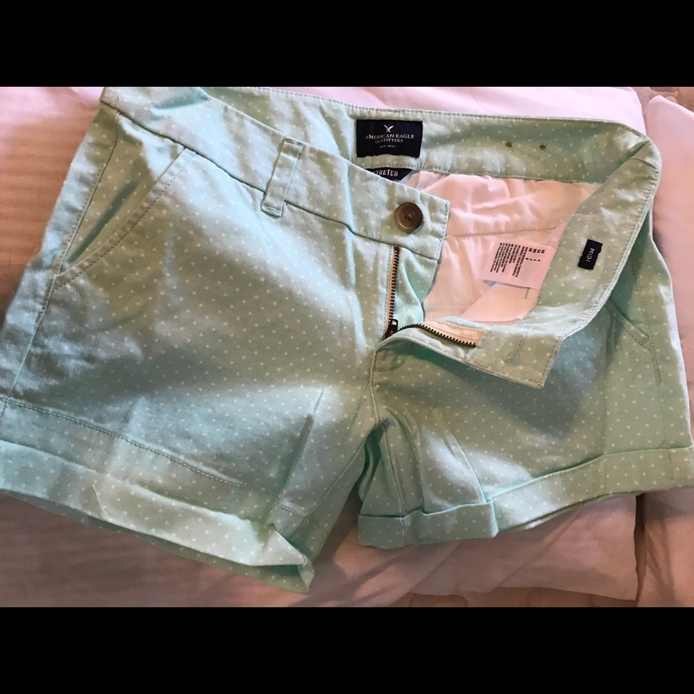 Aqua colored midi AE shorts w/ white polka dots
